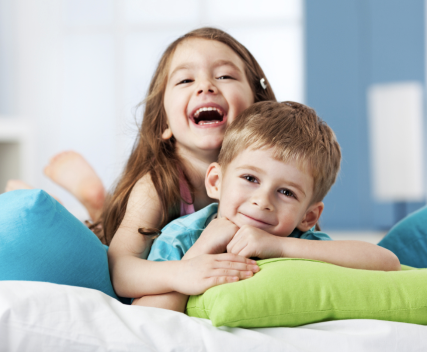 little girl laughing and having fun